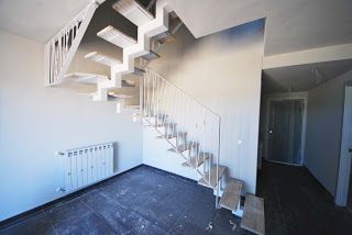 Salón escalera y entrada